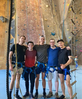 Members meeting up at a climbing gym